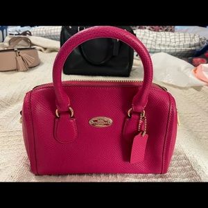 Coach .  Mini hot pink Coach doctor bag.  Detachable strap.